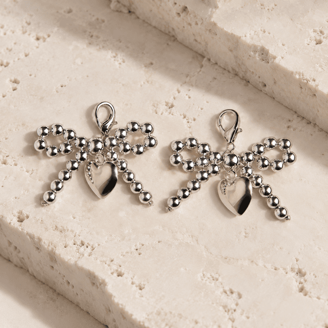 2-Pack Metal Shoe Charms — Silver-colored/bows